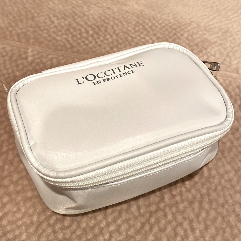 L'Occitane white travel toiletry bag airlines amenity kits nWOT